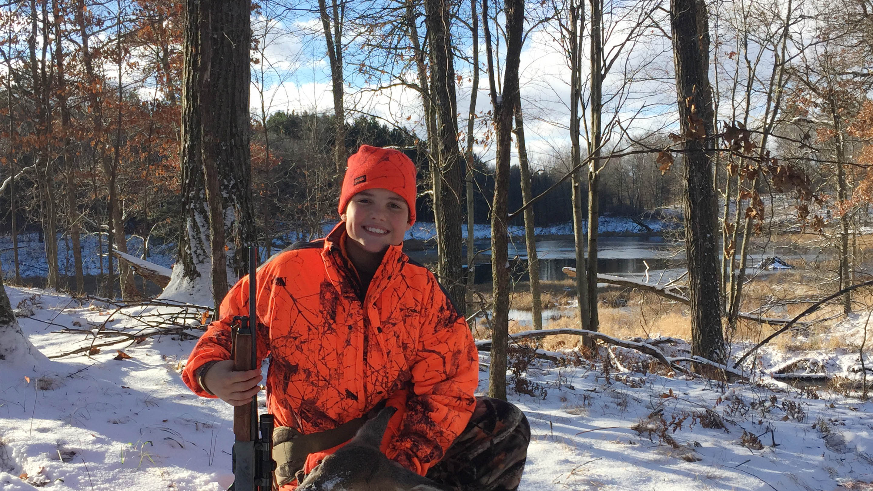 Youth hunter in youth hunting clothing