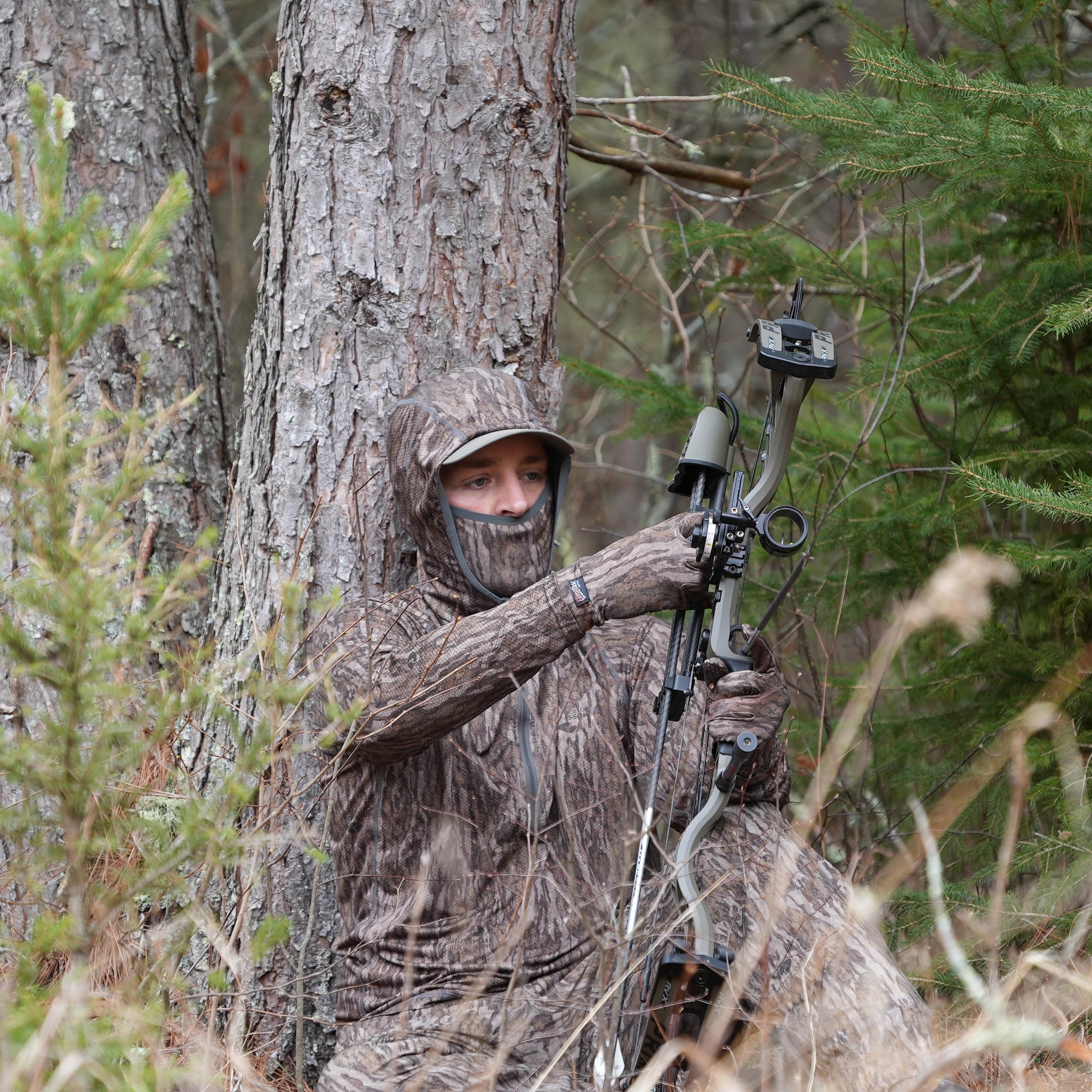 Gamehide Elimitick AeroFlex Hoodie - Lifestyle 1 - Mossy Oak New Bottomland