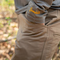 Load image into Gallery viewer, Gamehide Elimitick FieldFlex Pant - Lifestyle 1 - Tan
